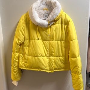 Bright yellow Sherpa lined winter jacket